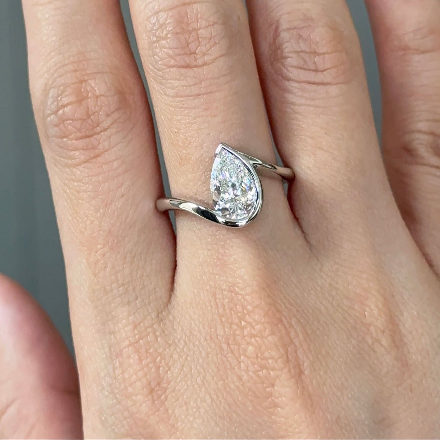 1.52 CT Pear Half Bezel Moissanite Engagement Ring