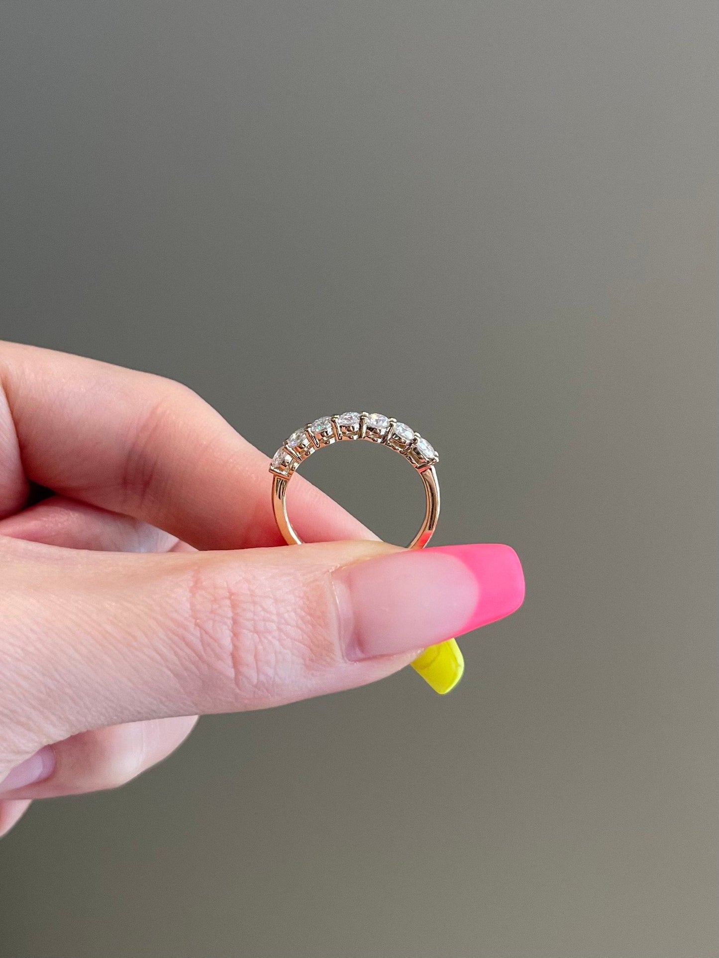 0.7 TCW Round Shaped Seven Stone Moissanite Wedding Band