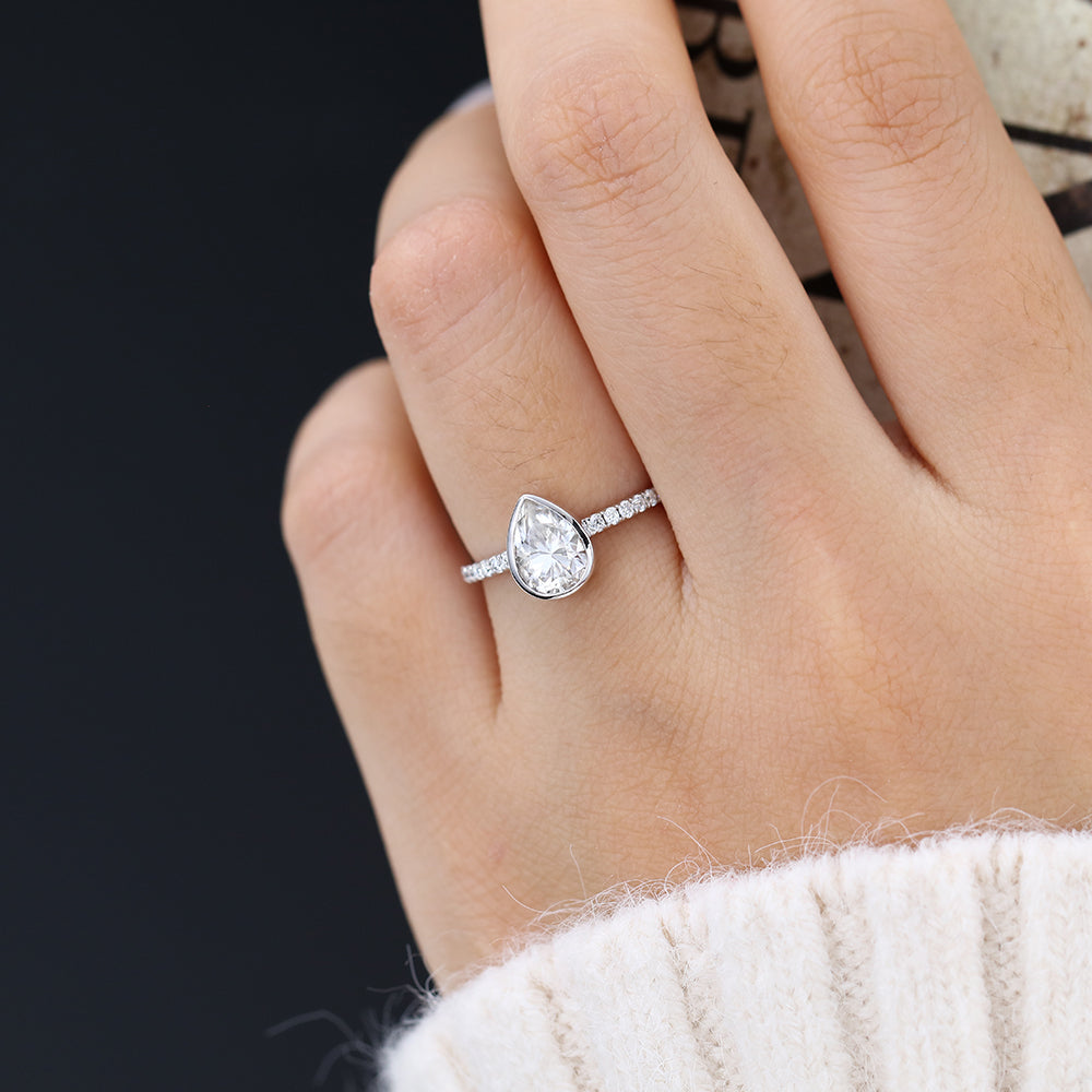 1 CT Pear Shaped Moissanite Engagement Ring In Pave Design