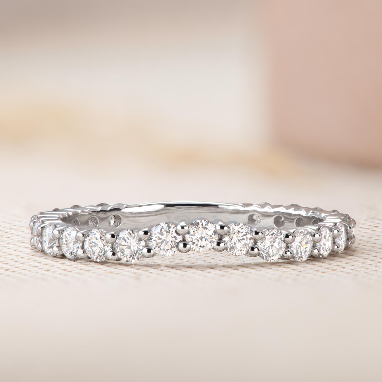 0.63 TCW Round Curved Moissanite Wedding Band