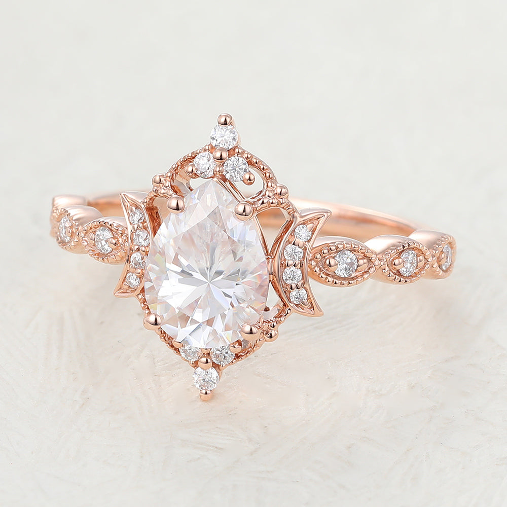 0.9 CT Pear Shaped Moissanite Engagement Ring In Cluster Design