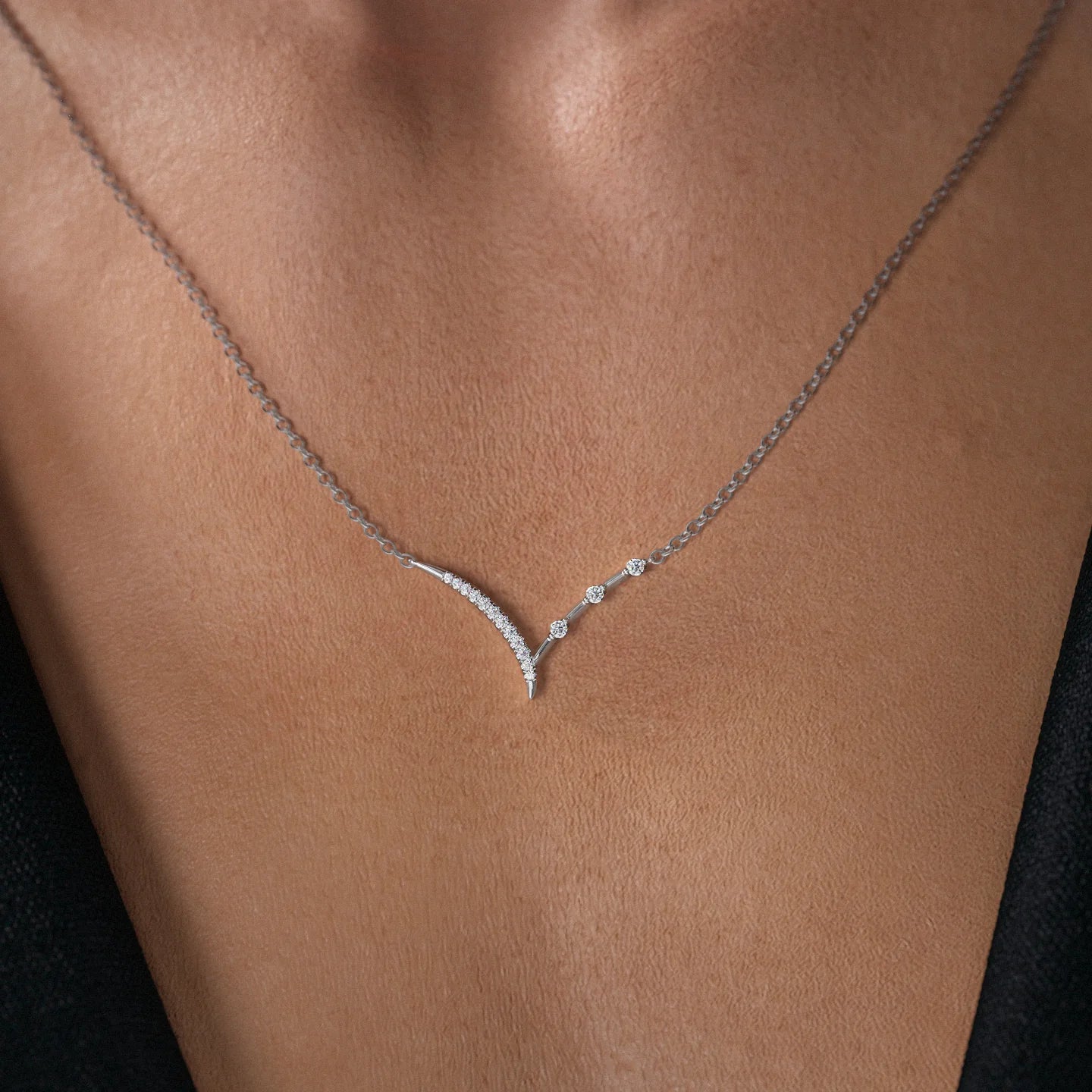 0.15 CT Round Shaped Moissanite Necklace In Half Chevron Design