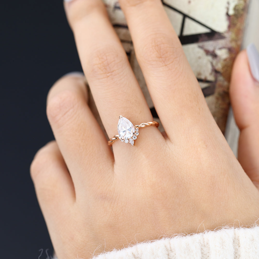 0.9 CT Pear Shaped Moissanite Engagement Ring In Cluster Design