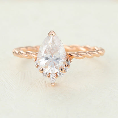 0.9 CT Pear Shaped Moissanite Engagement Ring In Cluster Design