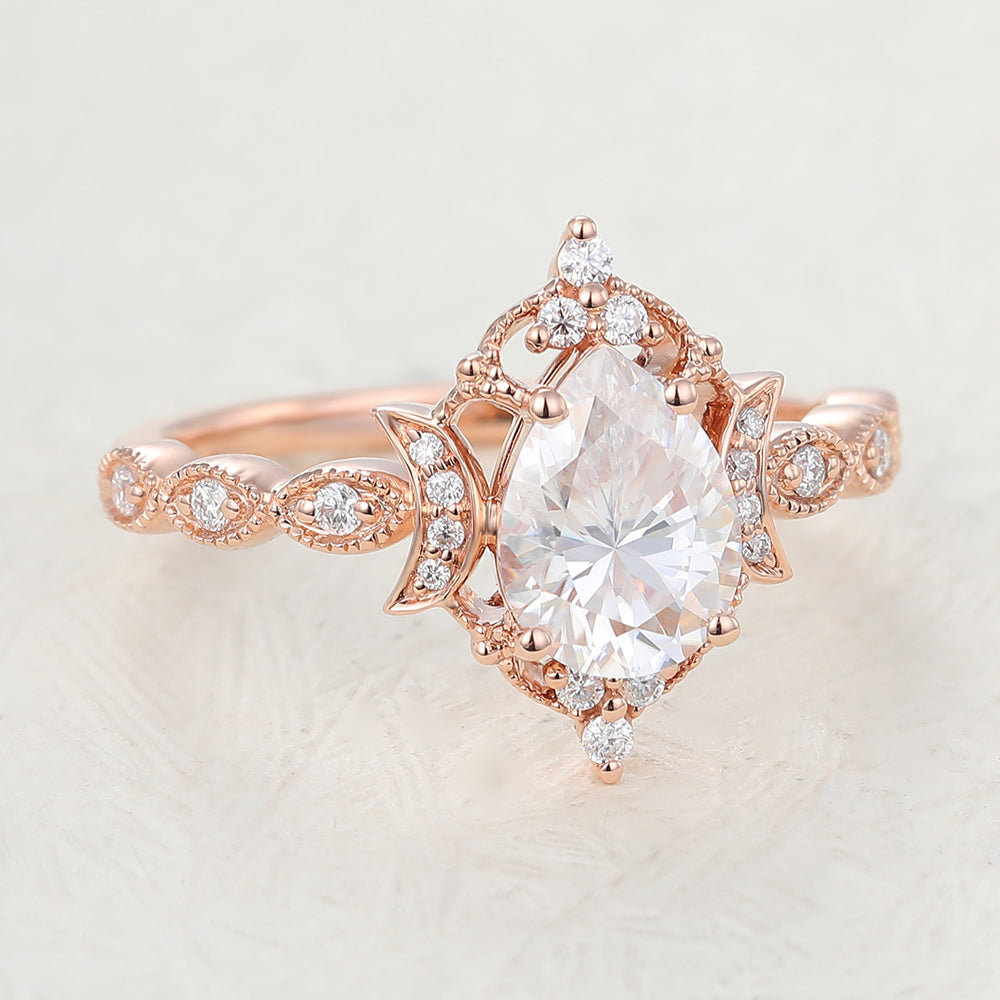 0.9 CT Pear Shaped Moissanite Engagement Ring In Cluster Design