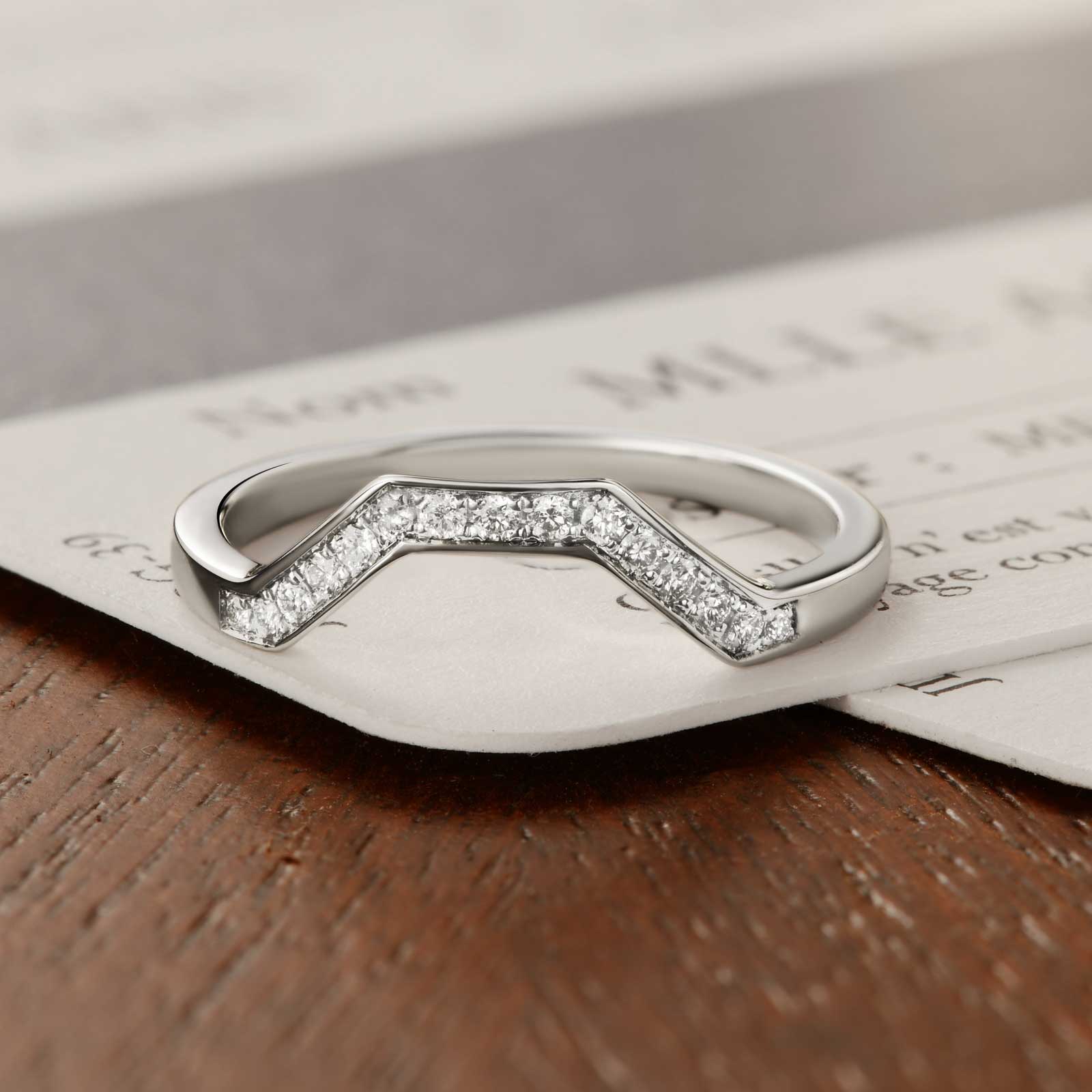 0.1 TCW Round Channel Setting Moissanite Wedding Band