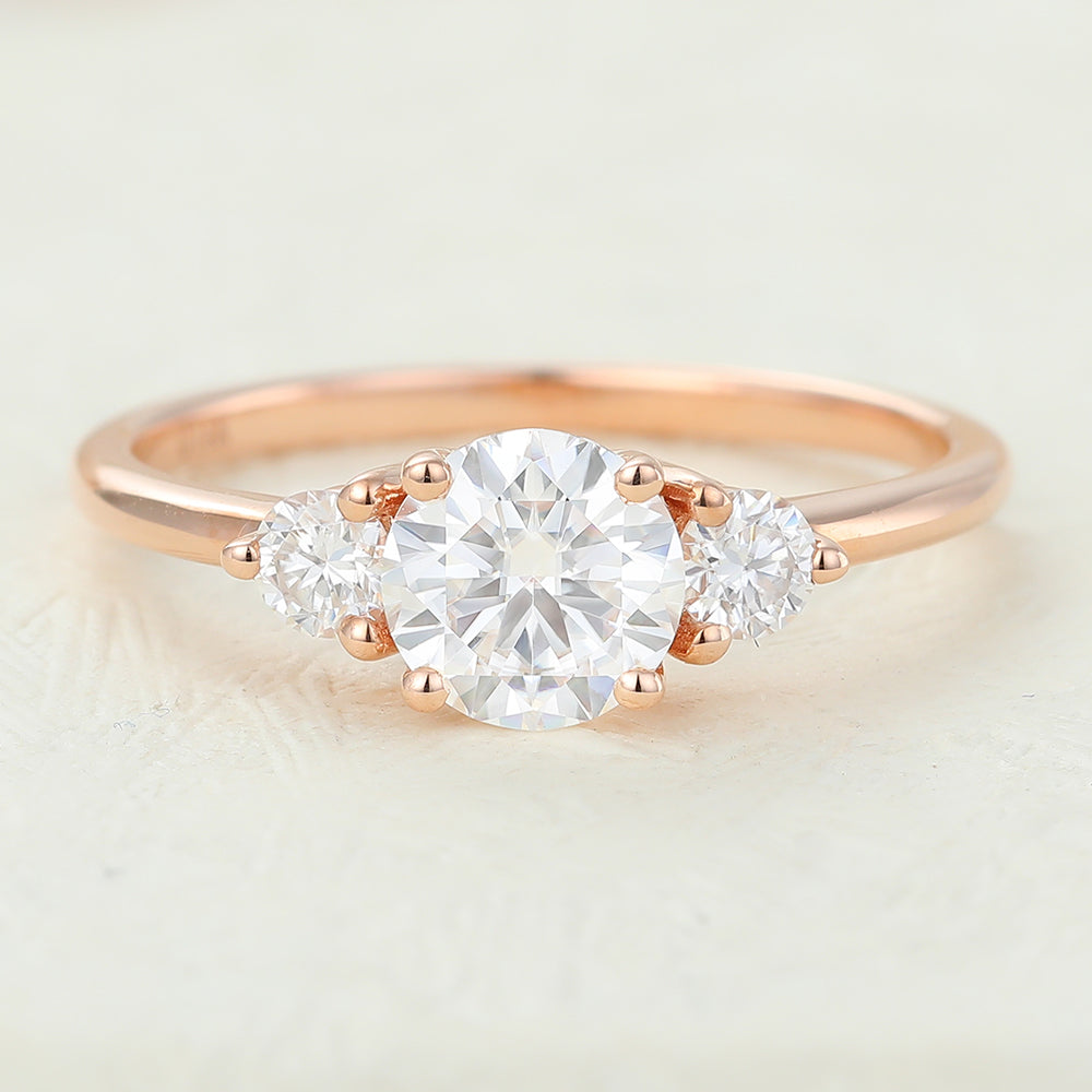 0.68 CT Round Shaped Moissanite Engagement Ring In Three Stone Design