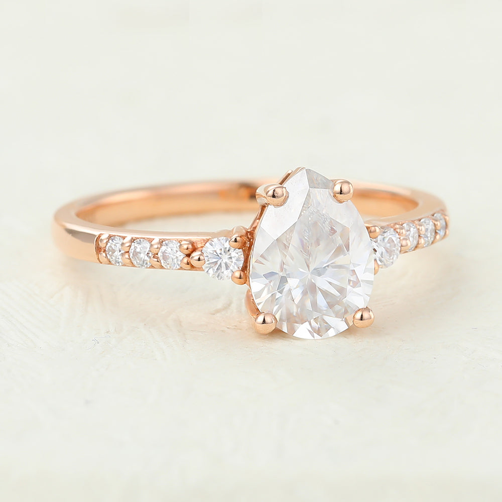 1 CT Pear Shaped Moissanite Engagement Ring In Three Stone Design