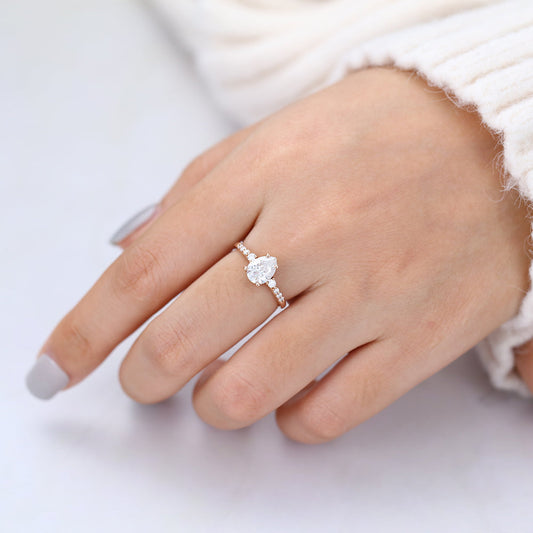 1 CT Pear Shaped Moissanite Engagement Ring In Three Stone Design