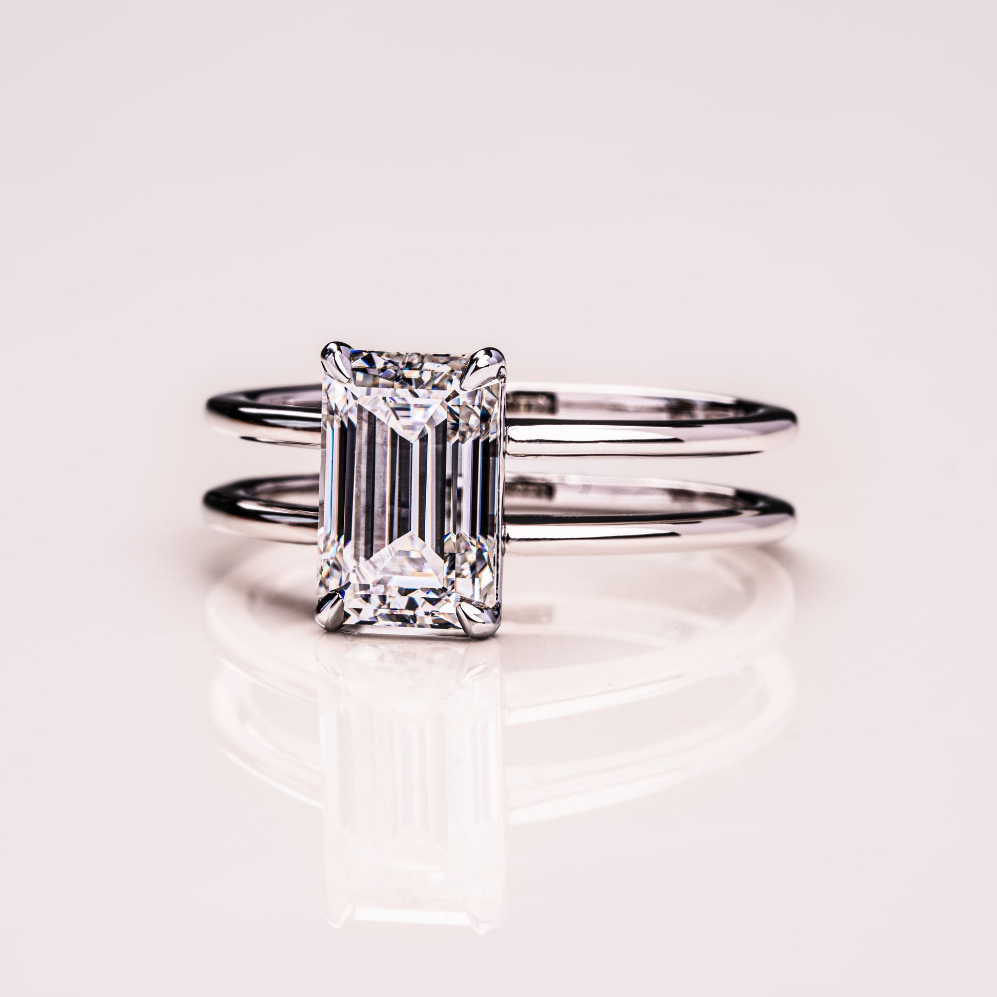 2.3 CT Emerald Solitaire & Double Shank Moissanite Engagement Ring