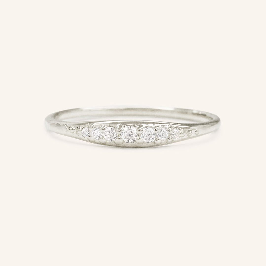 0.09 TCW Round Curved Moissanite Wedding Band