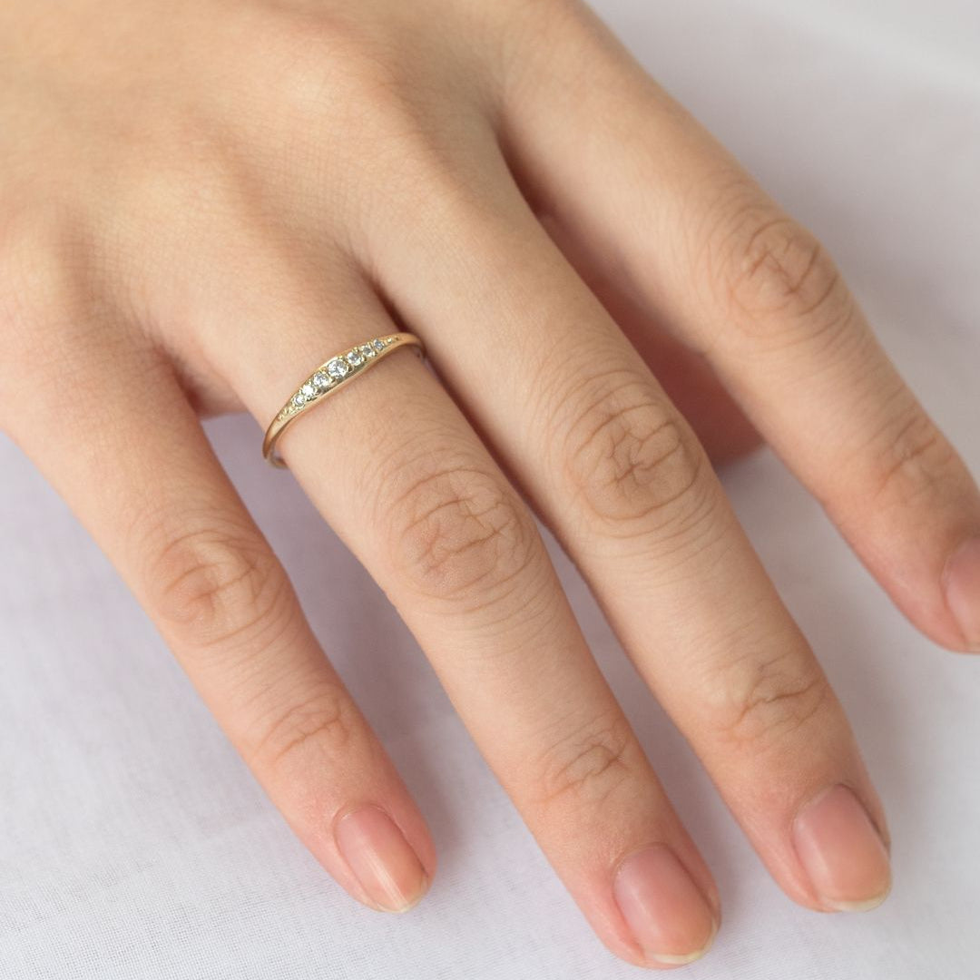 0.09 TCW Round Curved Moissanite Wedding Band