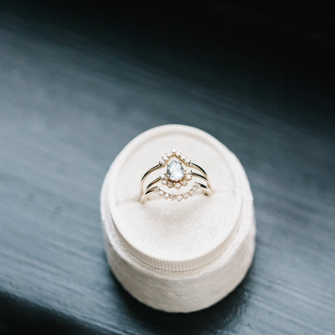 0.12 TCW Round Curved Moissanite Wedding Band