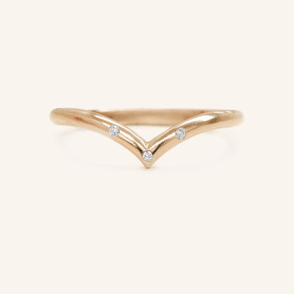 0.023 TCW Round Curved Moissanite Wedding Band