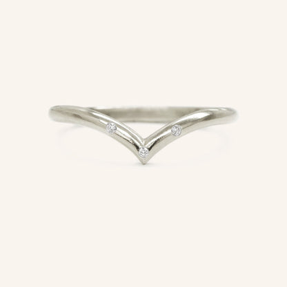 0.023 TCW Round Curved Moissanite Wedding Band