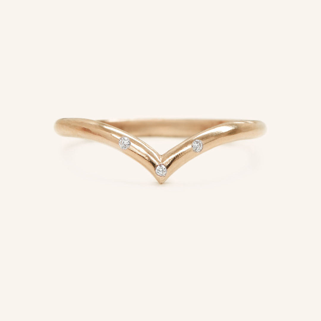 0.023 TCW Round Curved Moissanite Wedding Band