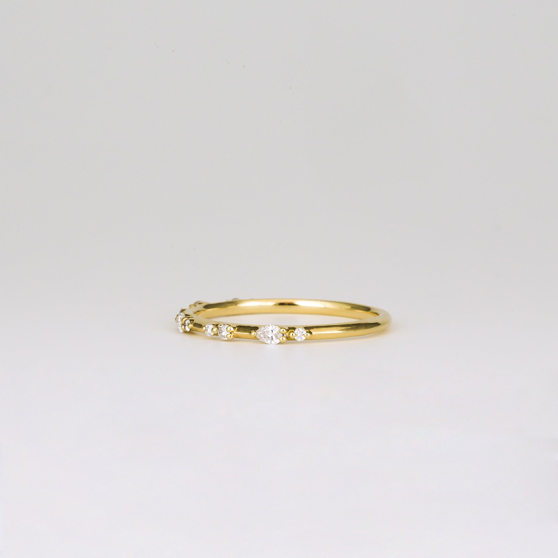 0.12 TCW Round & Pear Dainty Moissanite Wedding Band