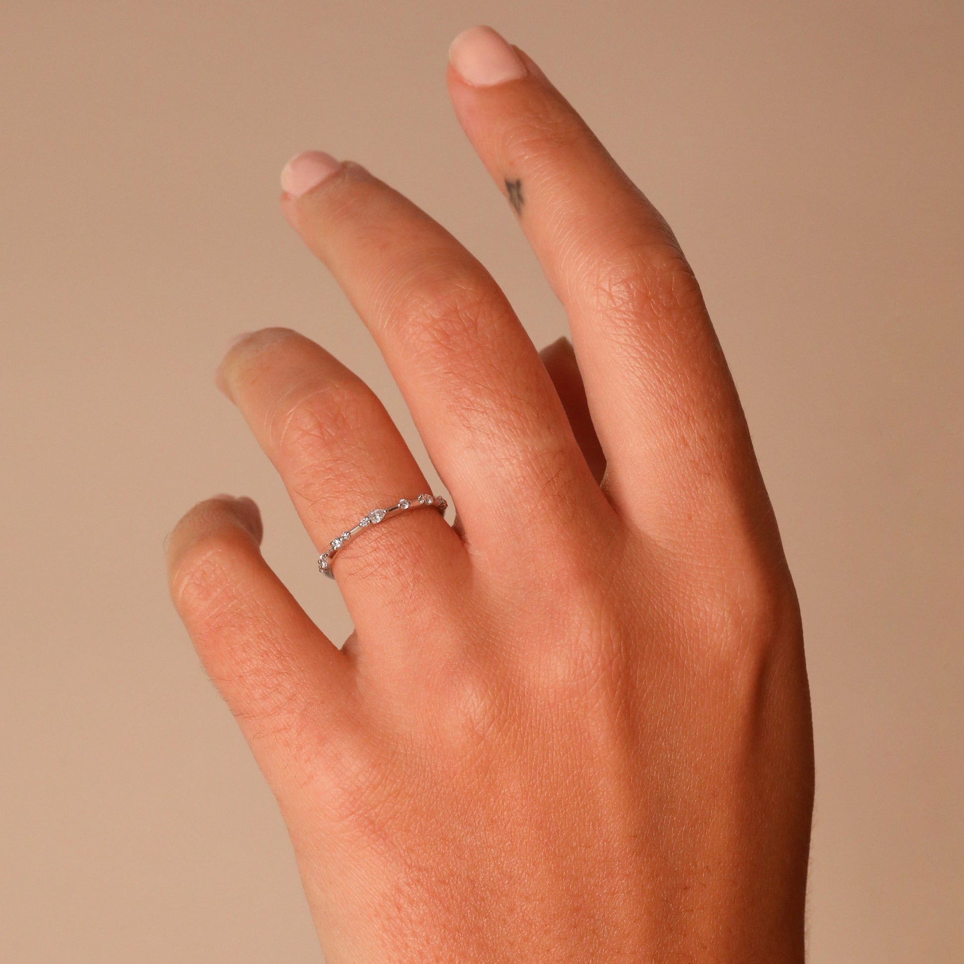 0.12 TCW Round & Pear Dainty Moissanite Wedding Band