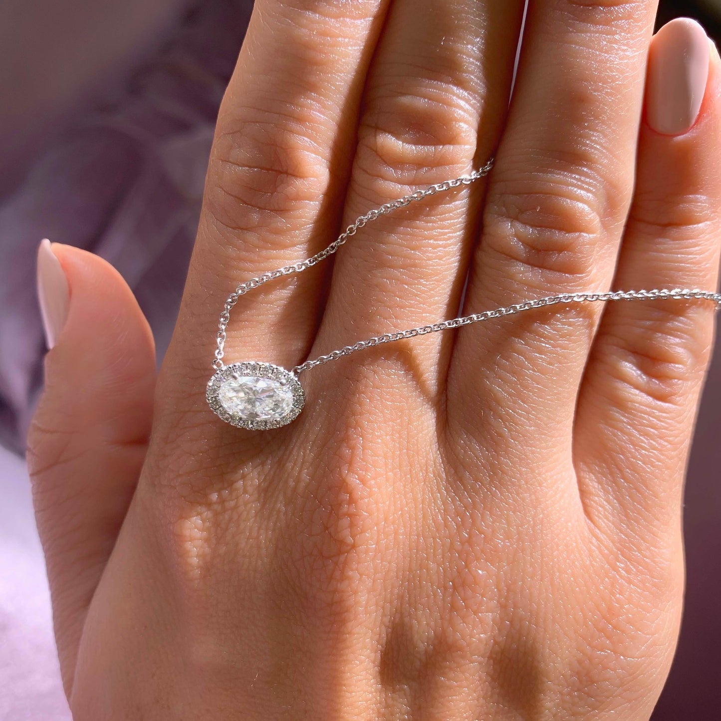 1.2 TCW Oval Moissanite Halo Necklace