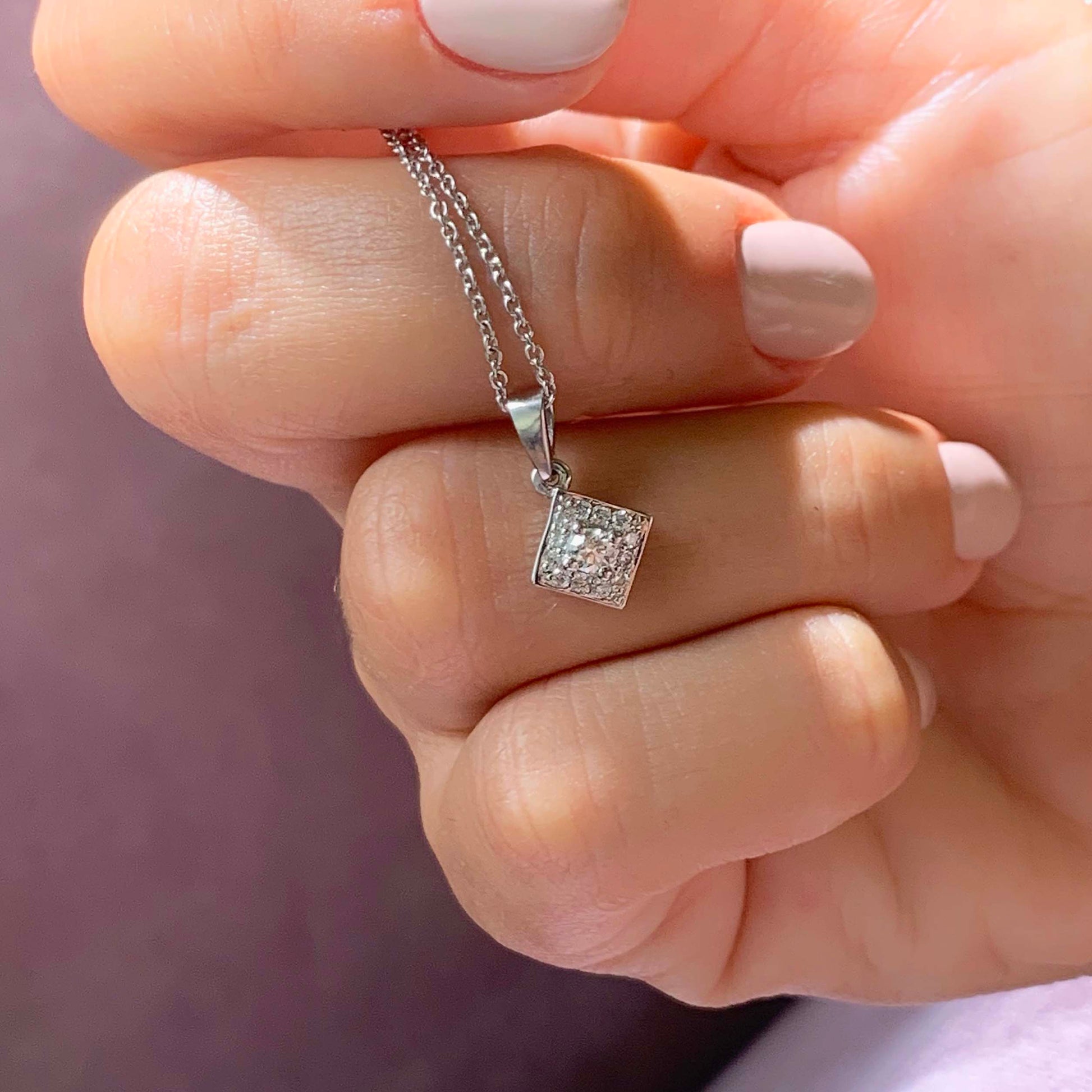 0.6 TCW Round Moissanite Halo Pendant Necklace