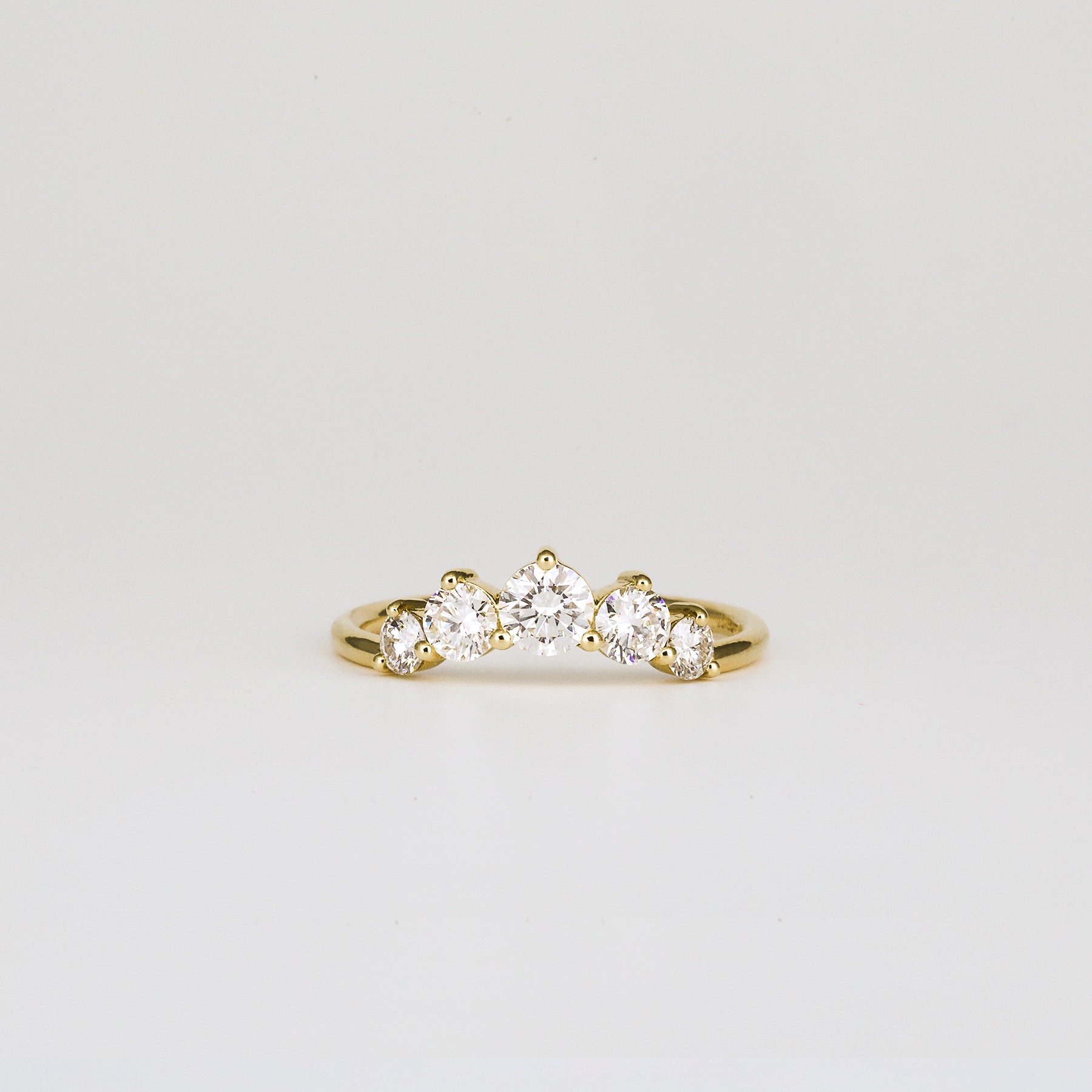 0.72 TCW Round Curved Moissanite Wedding Band