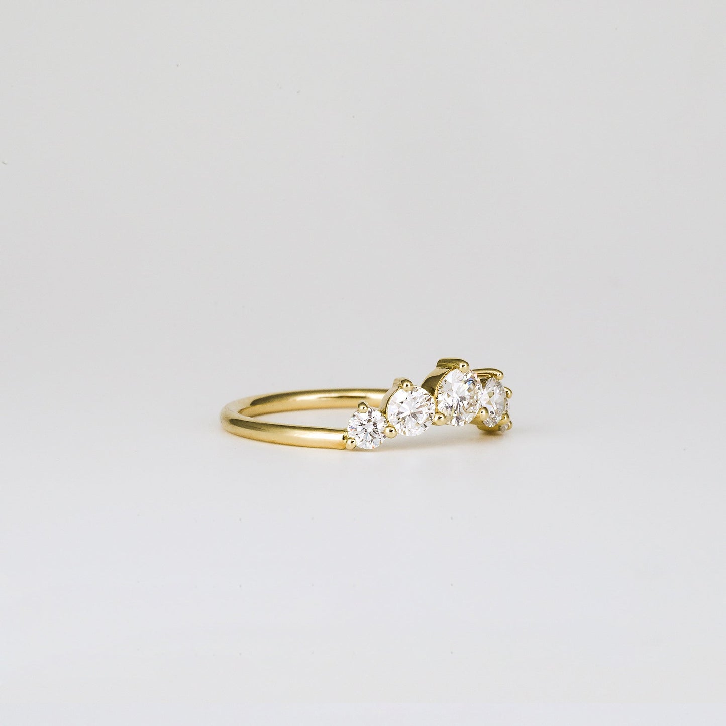 0.72 TCW Round Curved Moissanite Wedding Band