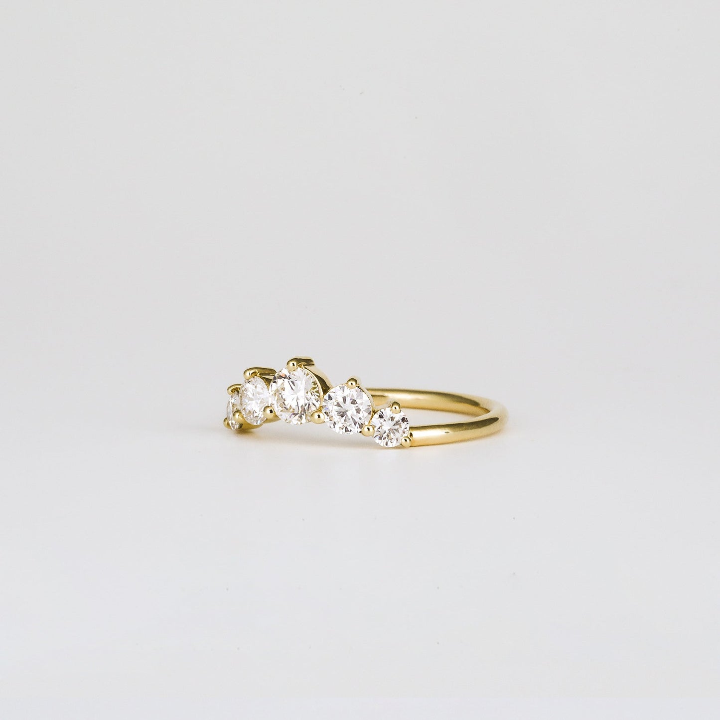 0.72 TCW Round Curved Moissanite Wedding Band