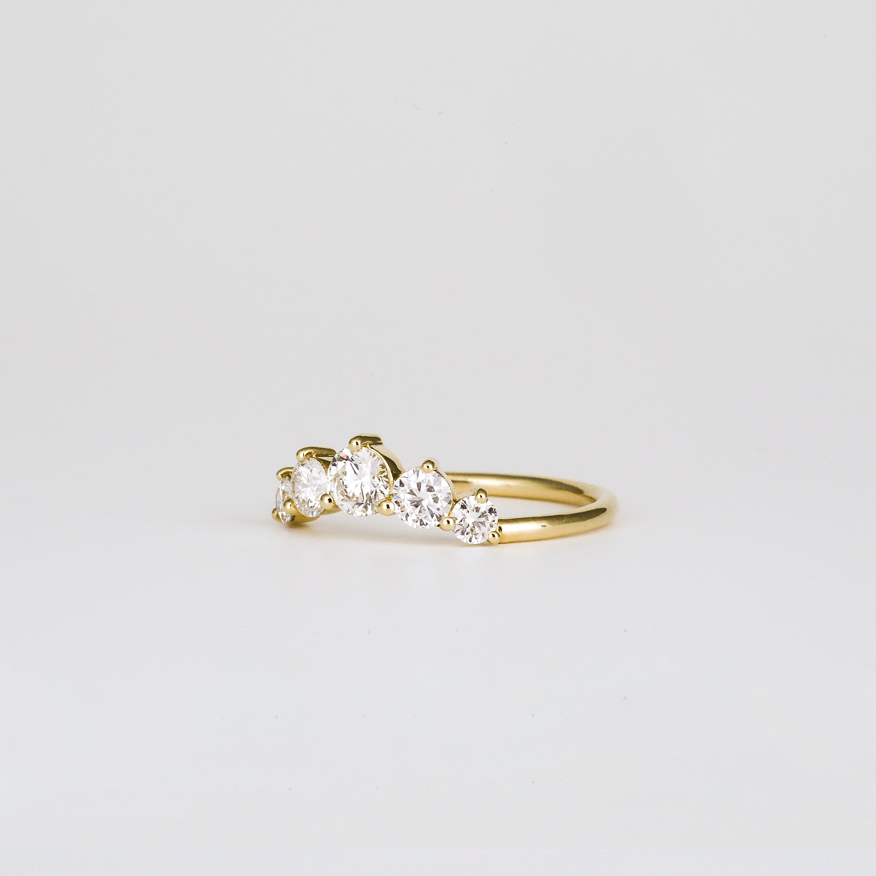 0.72 TCW Round Curved Moissanite Wedding Band