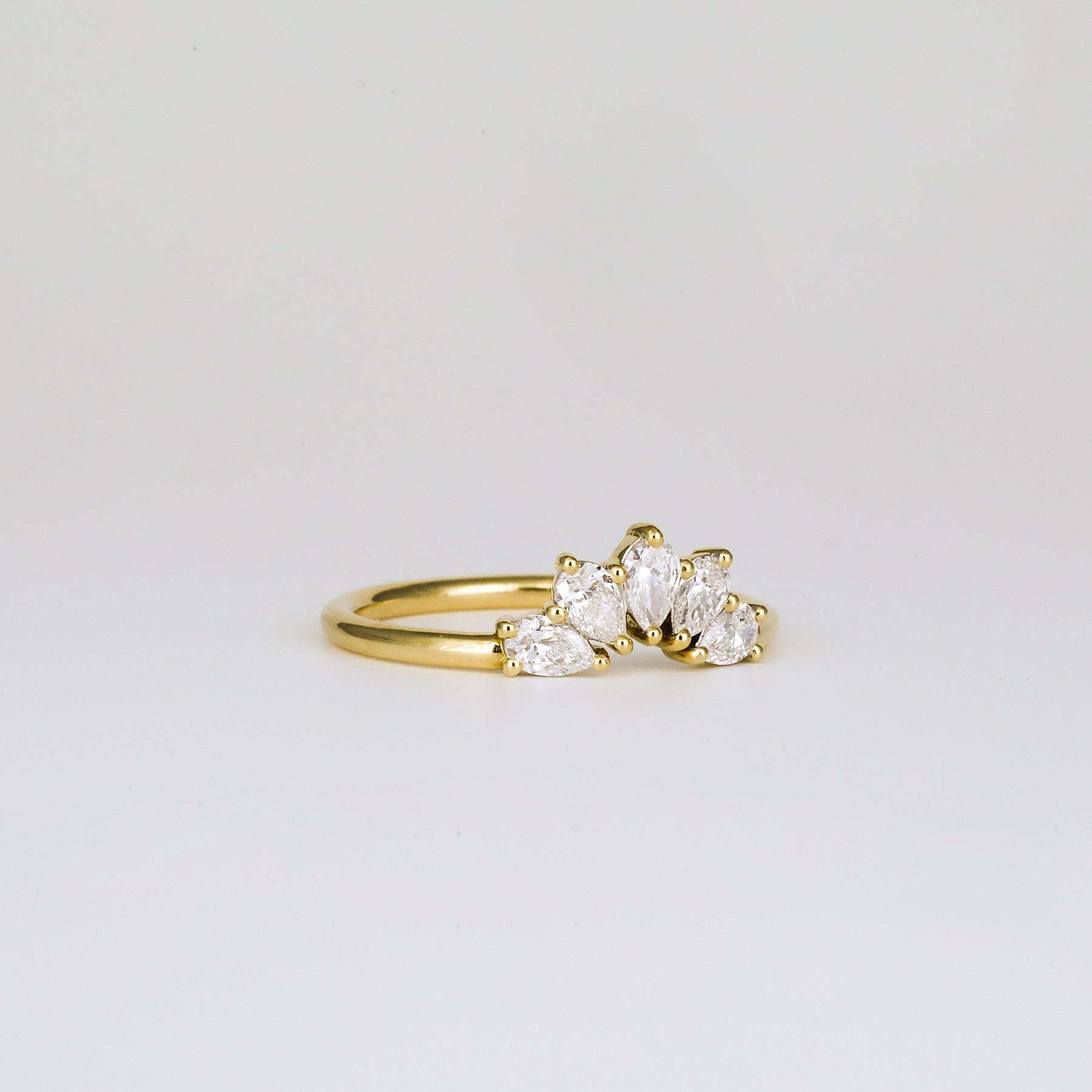 0.45 TCW Pear Five Stone & Curved Moissanite Wedding Band