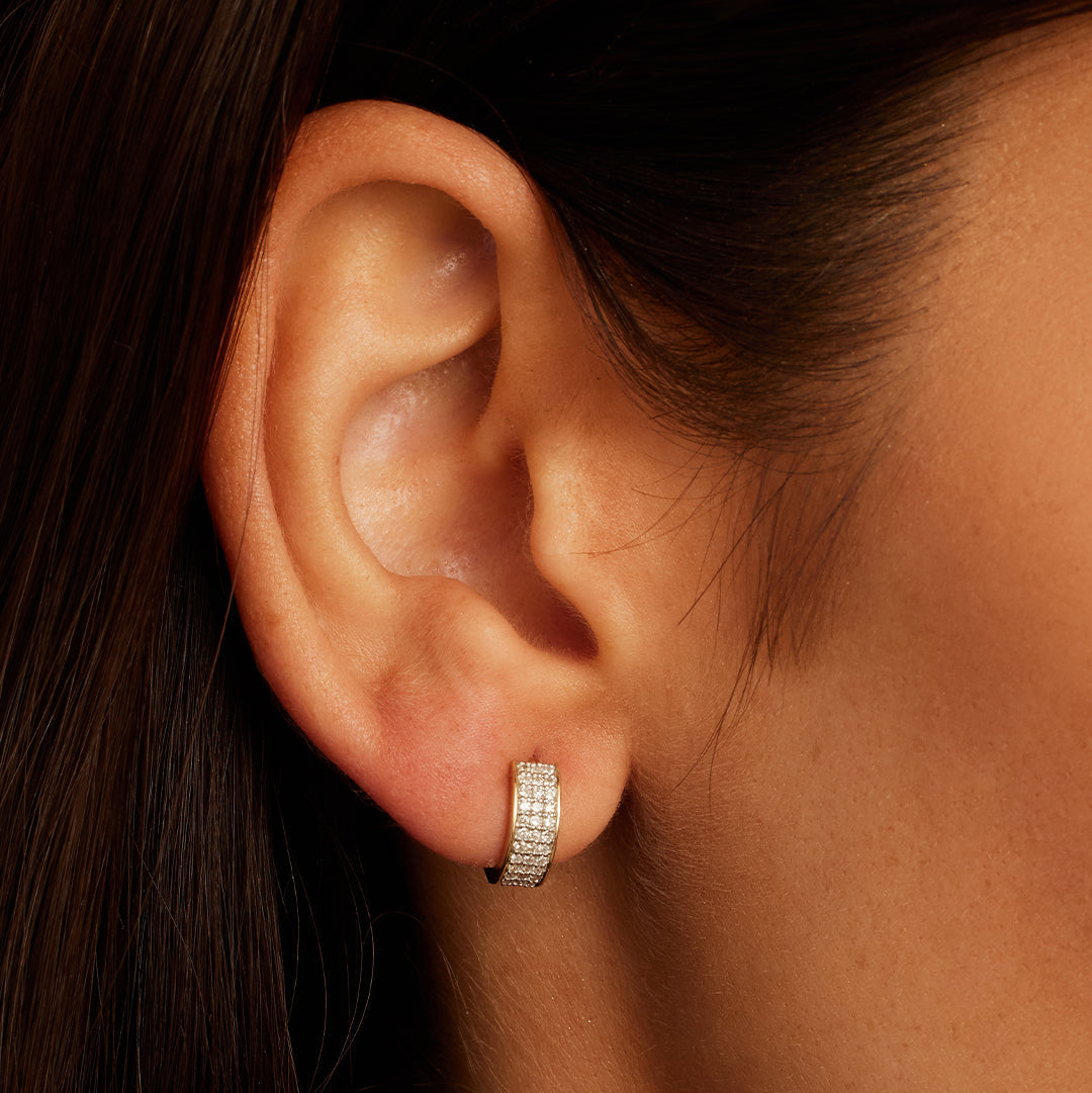 0.2 TCW Round Moissanite Huggies Earrings
