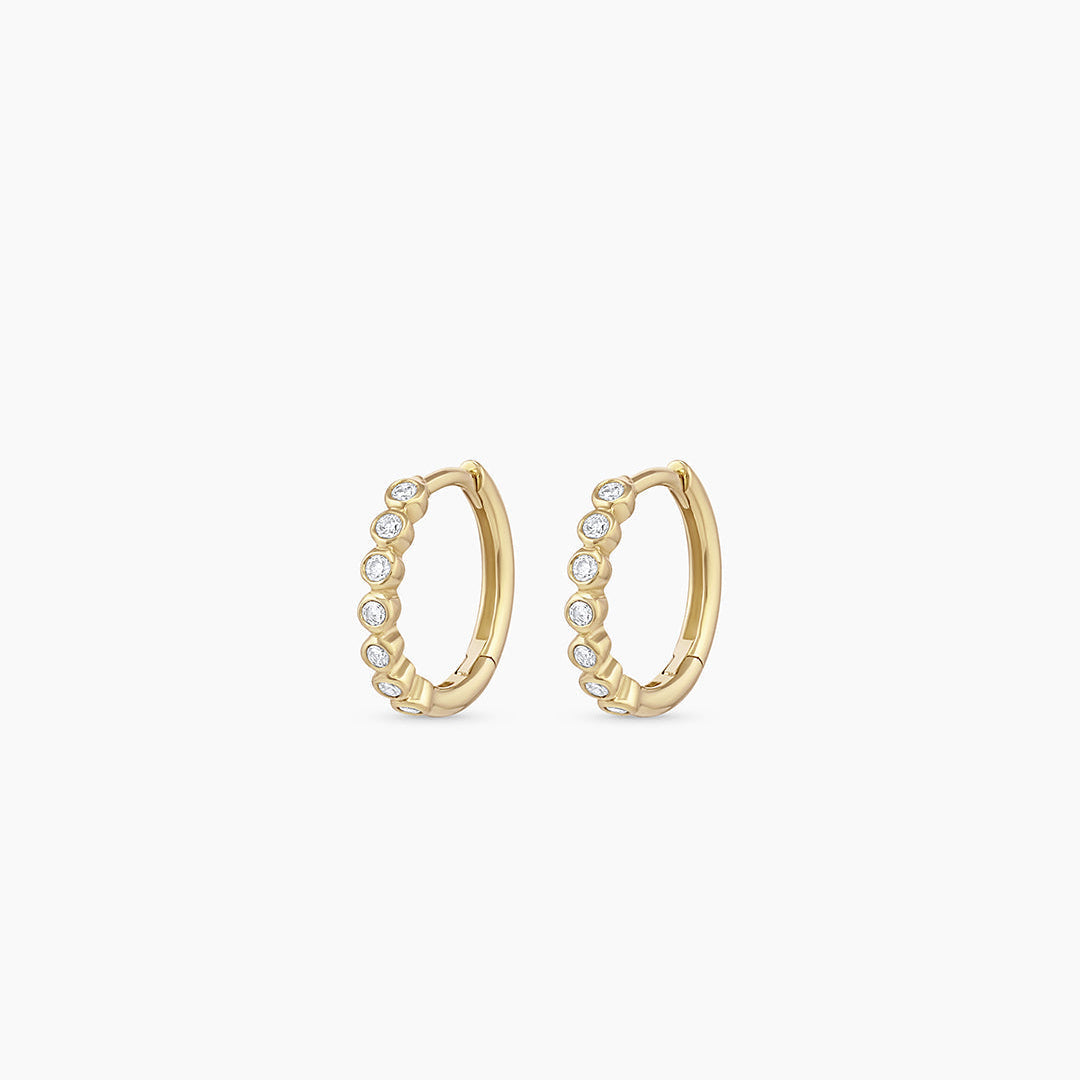 0.098 TCW Round Moissanite Huggies Earrings