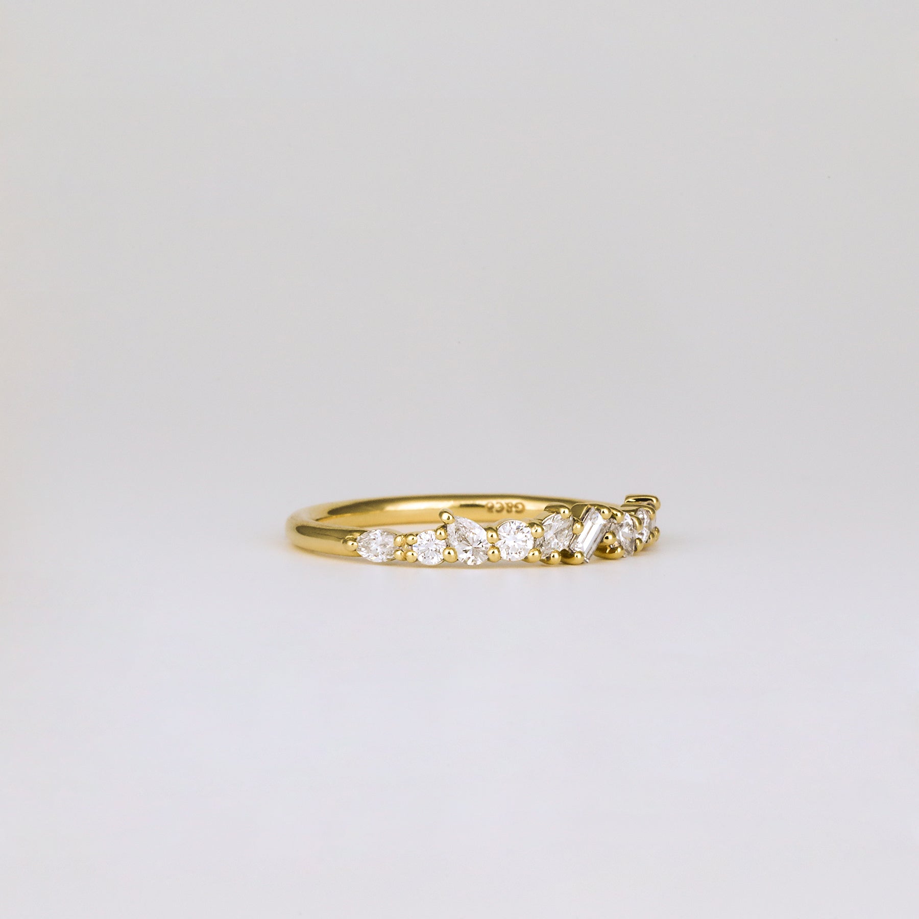 0.38 TCW Baguette, Pear, Oval, Round & Asscher Cluster Moissanite Wedding Band