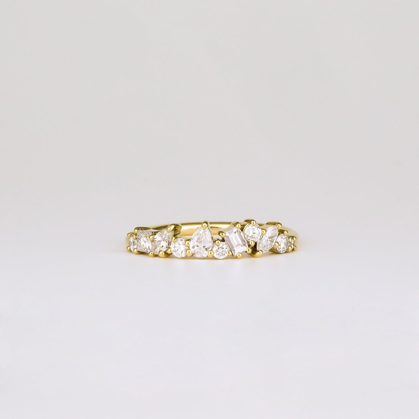 0.57 TCW Baguette, Pear, Round, Marquise & Princess Cluster Moissanite Wedding Band