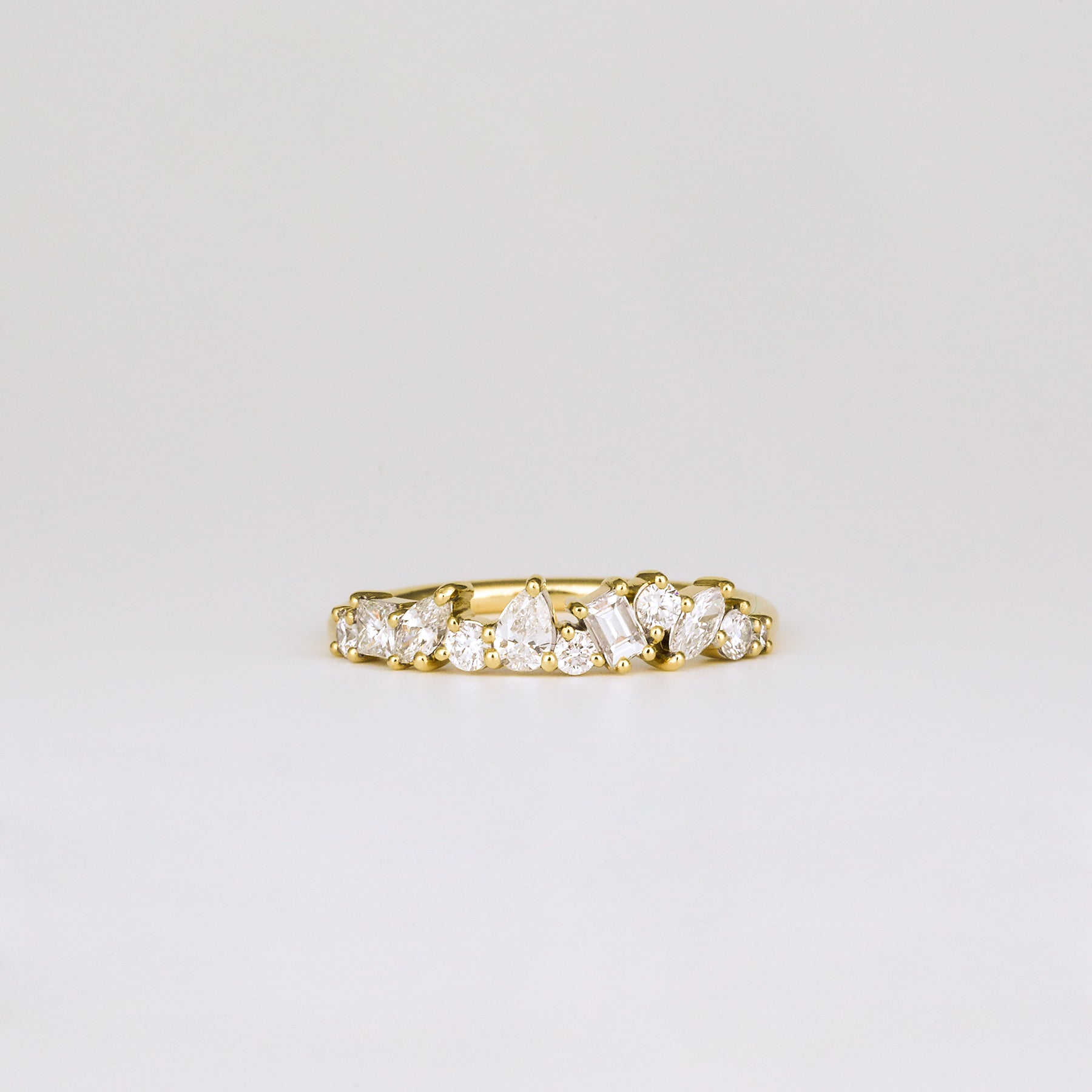 0.57 TCW Baguette, Pear, Round, Marquise & Princess Cluster Moissanite Wedding Band