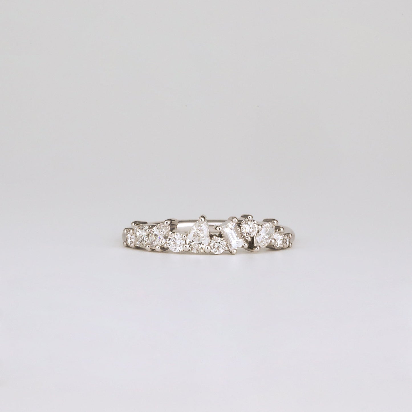 0.57 TCW Baguette, Pear, Round, Marquise & Princess Cluster Moissanite Wedding Band