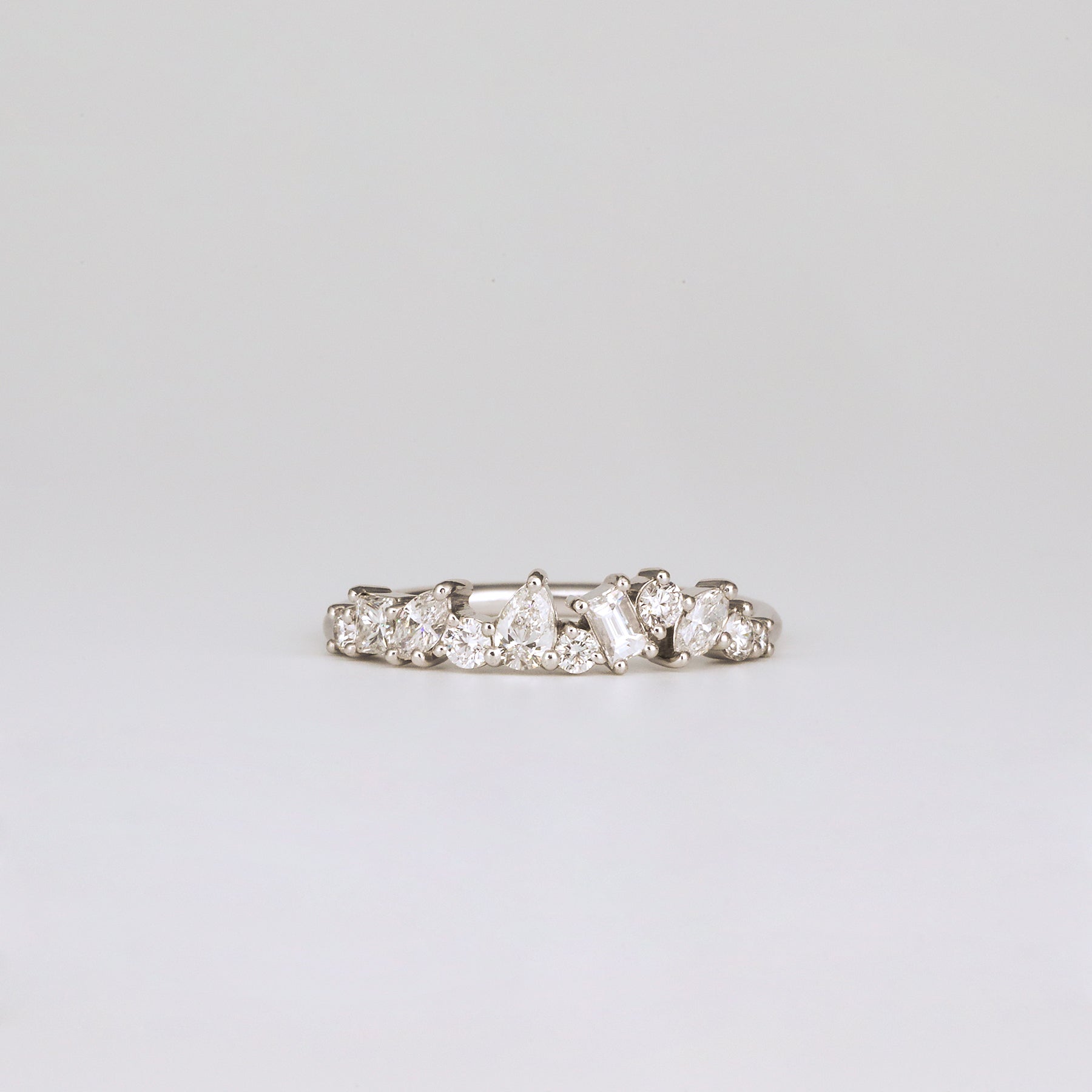 0.57 TCW Baguette, Pear, Round, Marquise & Princess Cluster Moissanite Wedding Band