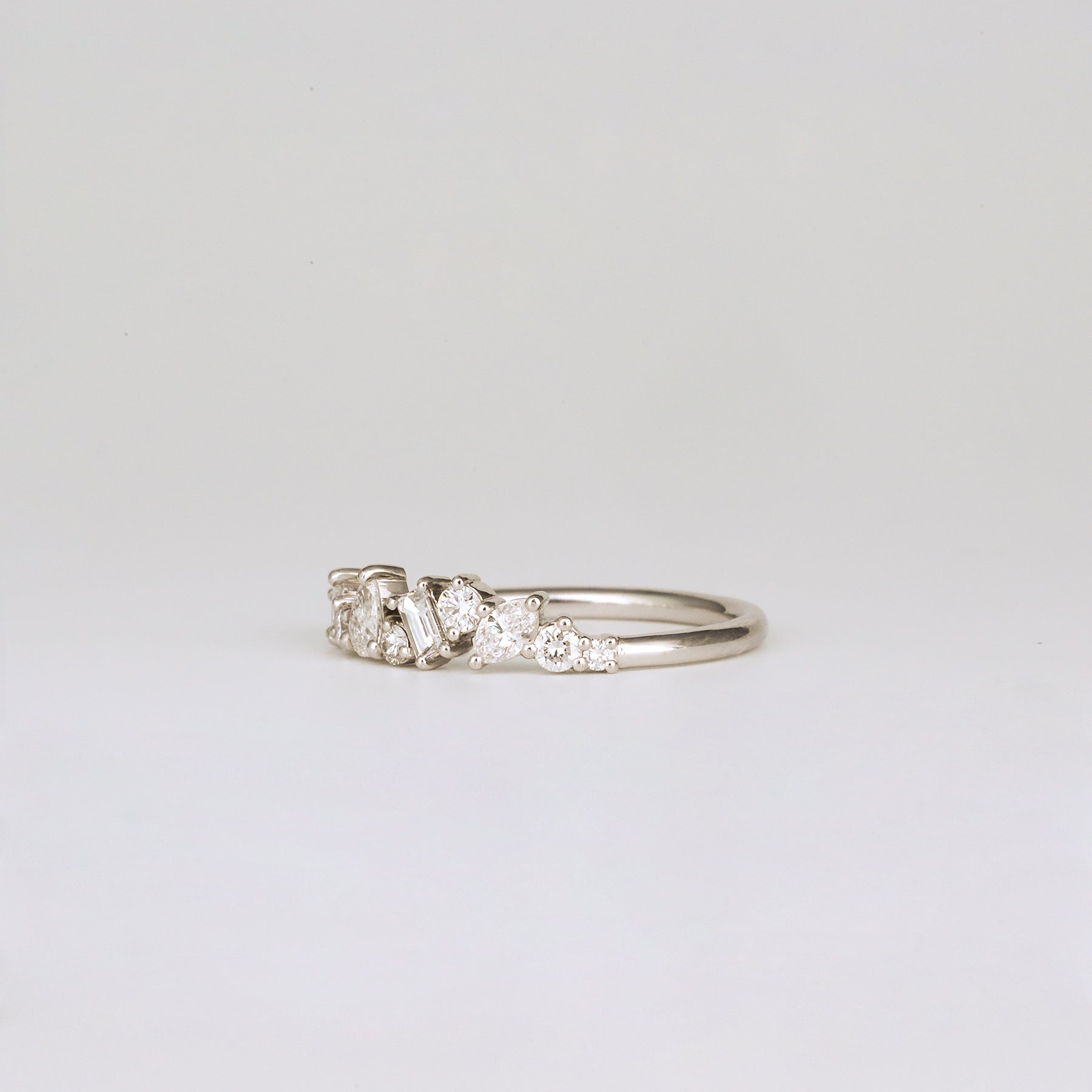 0.57 TCW Baguette, Pear, Round, Marquise & Princess Cluster Moissanite Wedding Band