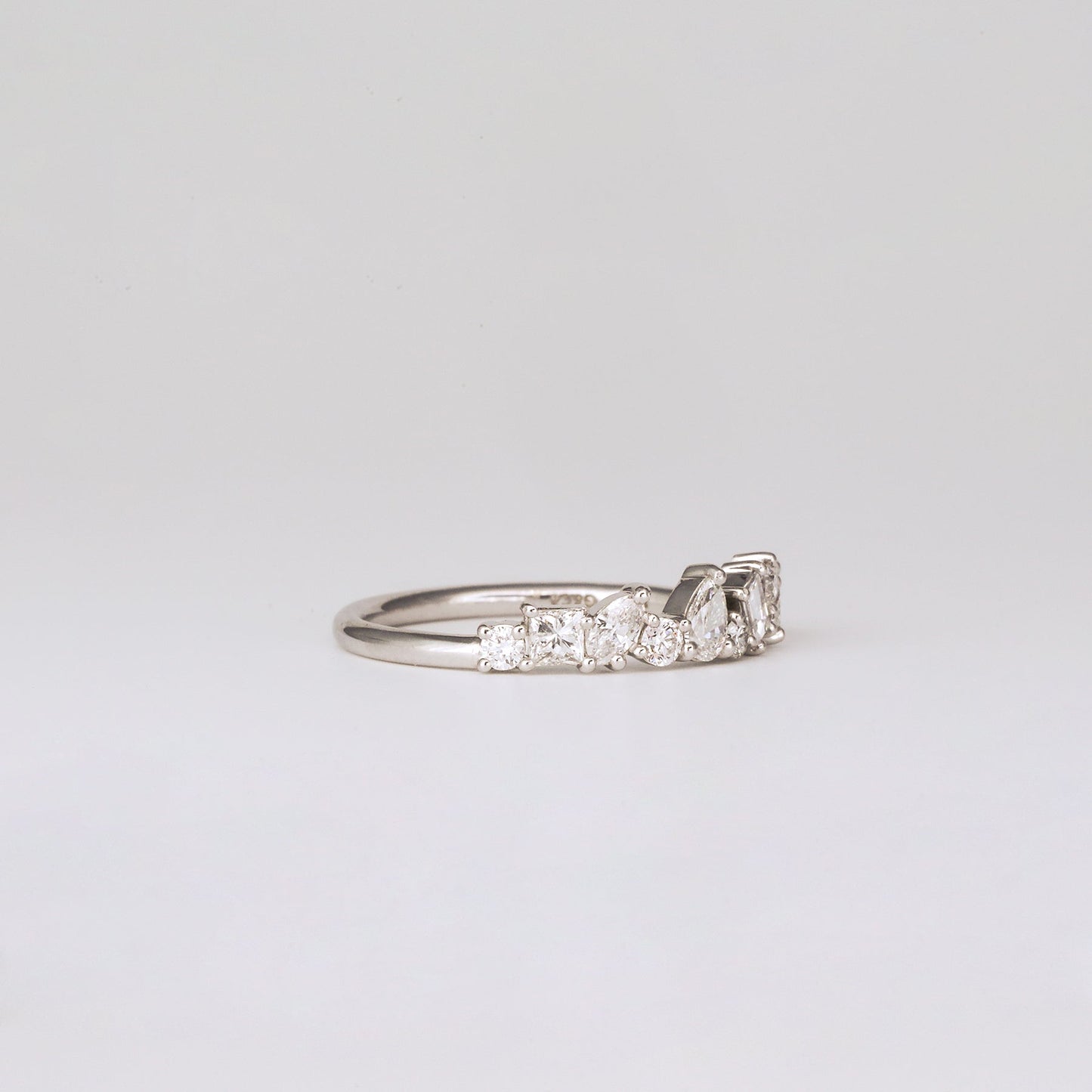 0.57 TCW Baguette, Pear, Round, Marquise & Princess Cluster Moissanite Wedding Band