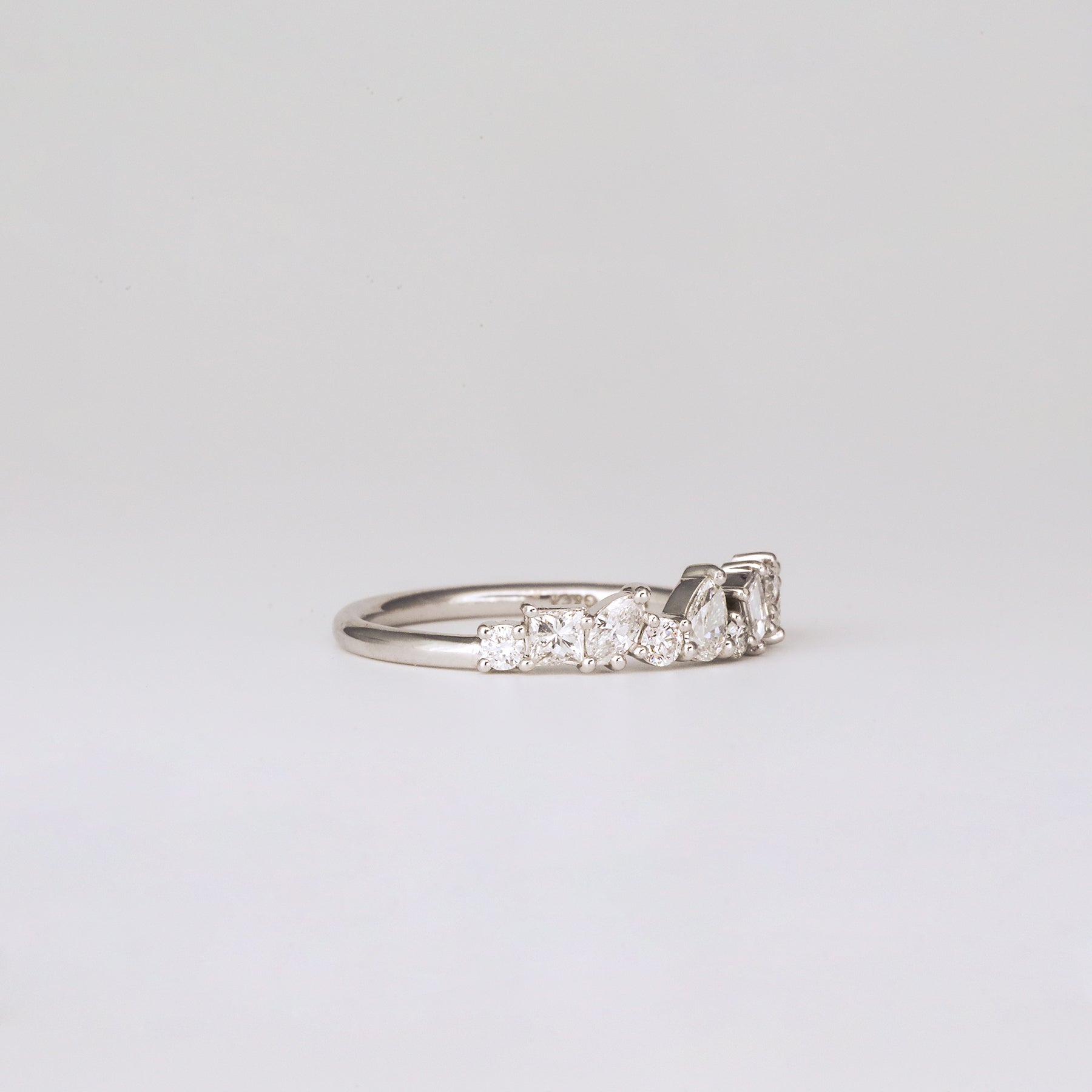 0.57 TCW Baguette, Pear, Round, Marquise & Princess Cluster Moissanite Wedding Band