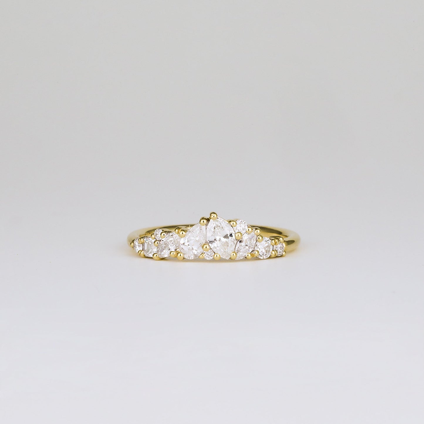 0.61 TCW Pear, Marquise, Round & Asscher Cluster Moissanite Wedding Band