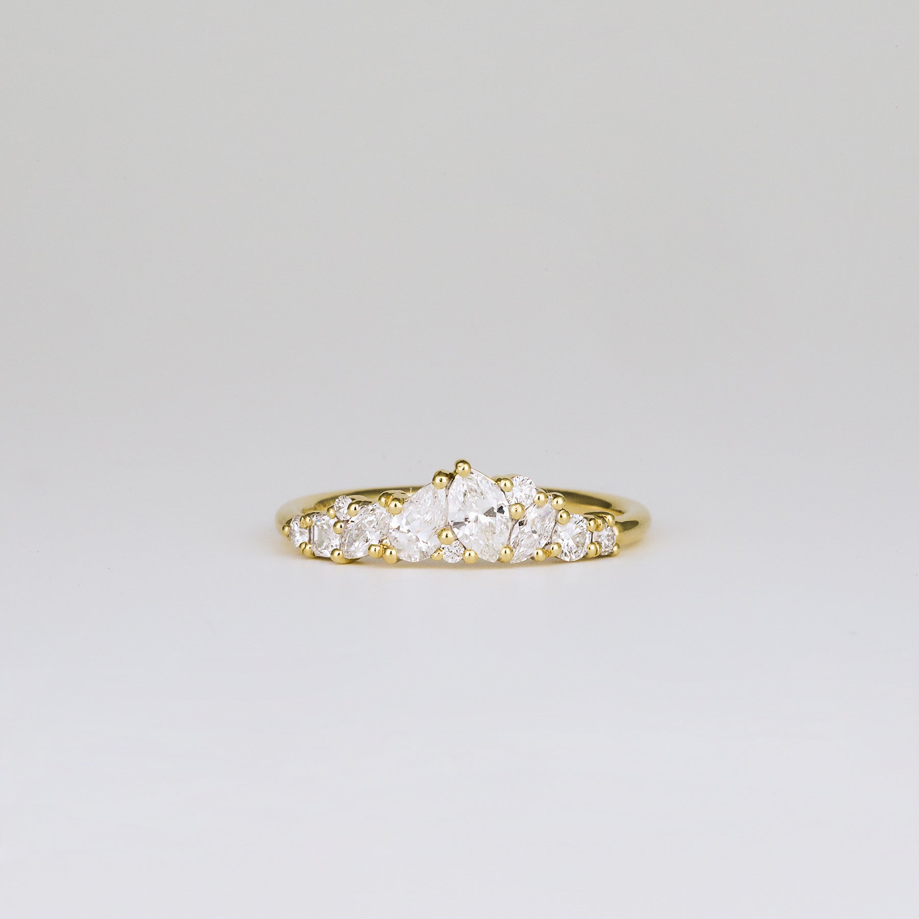 0.61 TCW Pear, Marquise, Round & Asscher Cluster Moissanite Wedding Band