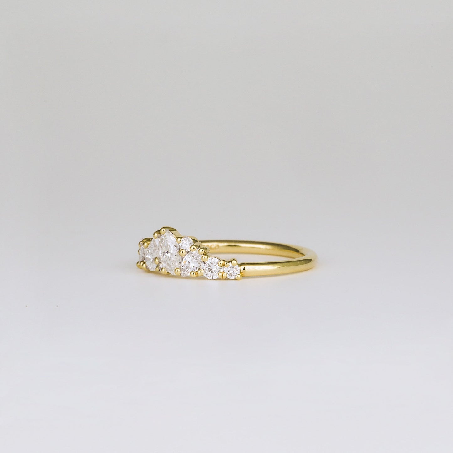 0.61 TCW Pear, Marquise, Round & Asscher Cluster Moissanite Wedding Band