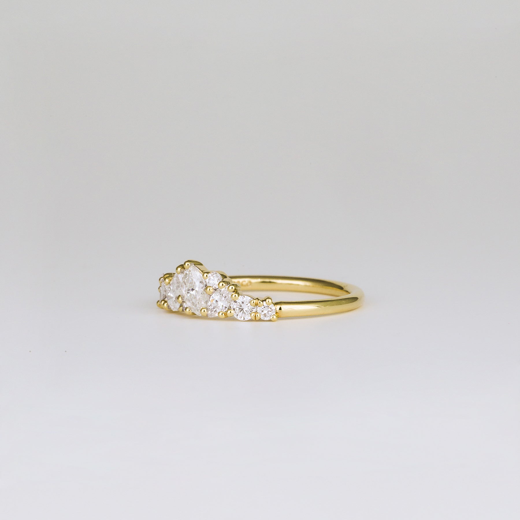 0.61 TCW Pear, Marquise, Round & Asscher Cluster Moissanite Wedding Band