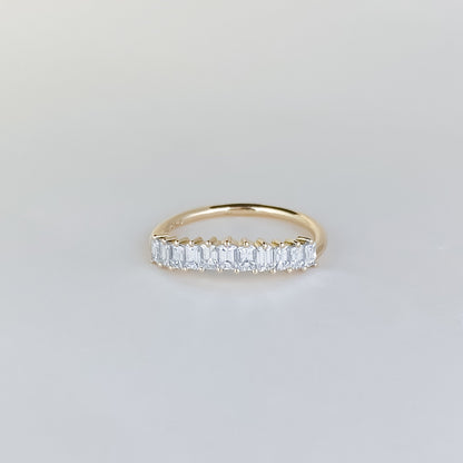 0.68 TCW Emerald Curved Moissanite Wedding Band