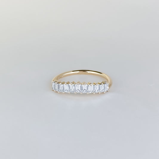 0.68 TCW Emerald Curved Moissanite Wedding Band