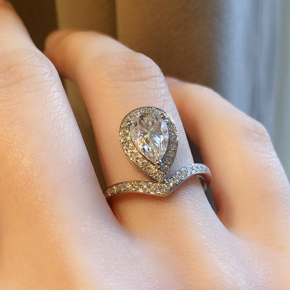 1.5 CT Pear Halo & Pave Moissanite Engagement Ring
