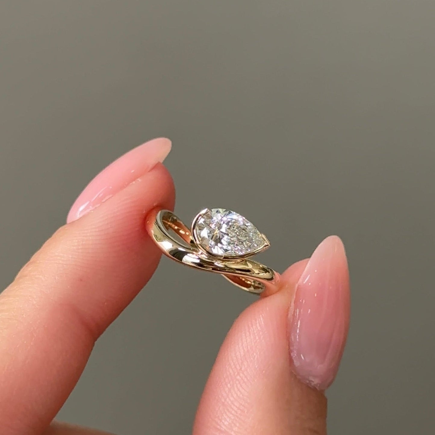 0.79 CT Pear Half Bezel Moissanite Engagement Ring