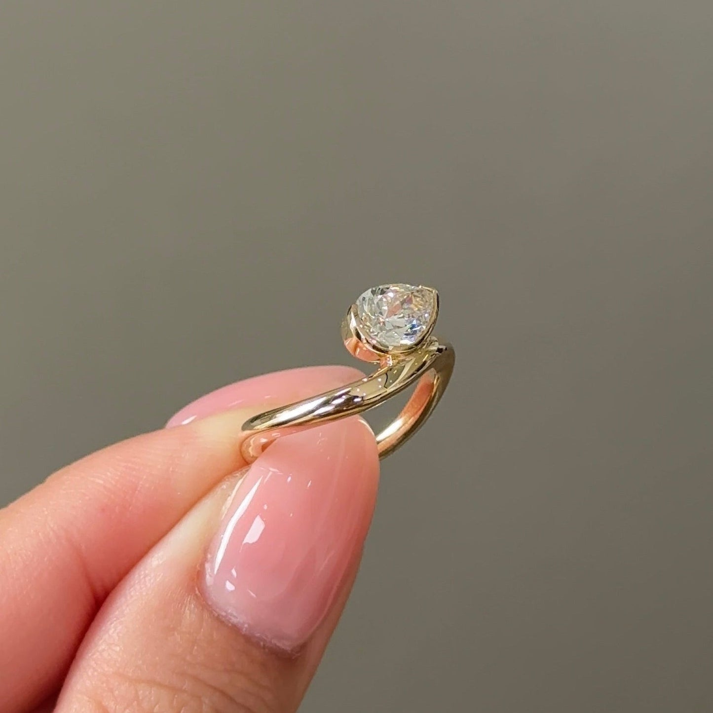 0.79 CT Pear Half Bezel Moissanite Engagement Ring