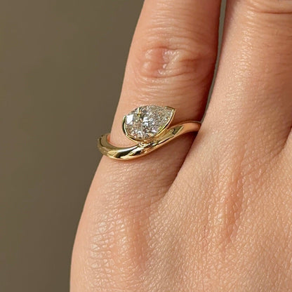 0.79 CT Pear Half Bezel Moissanite Engagement Ring