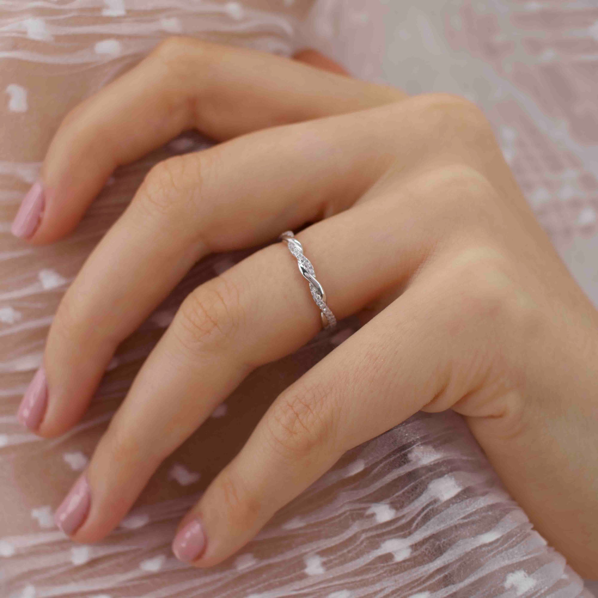 0.2 TCW Round Twisted Moissanite Wedding Band